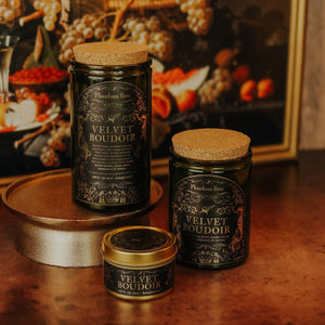 Side by side shot of the three sizes of Velvet Boudoir soy candles – 15 oz jar, 11 oz jar, and 3.3 oz gold tin.